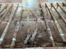 Dry-rot affected timbers exposed